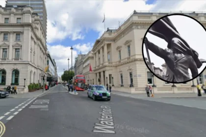 Banksy‑style statue of man blinded by flag appears in Waterloo Place London 2026